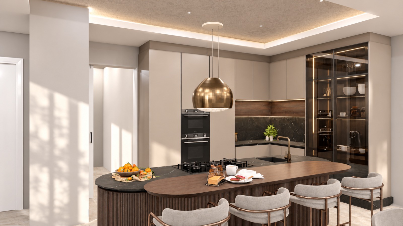 Island and tall cabinetry with integrated ovens